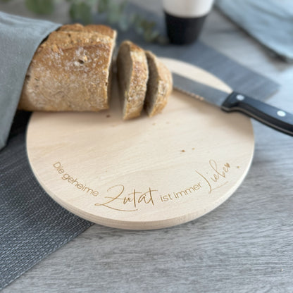 Schneidebrett - Die geheime Zutat ist immer Liebe - rund D: 24 cm - Deisterwerke