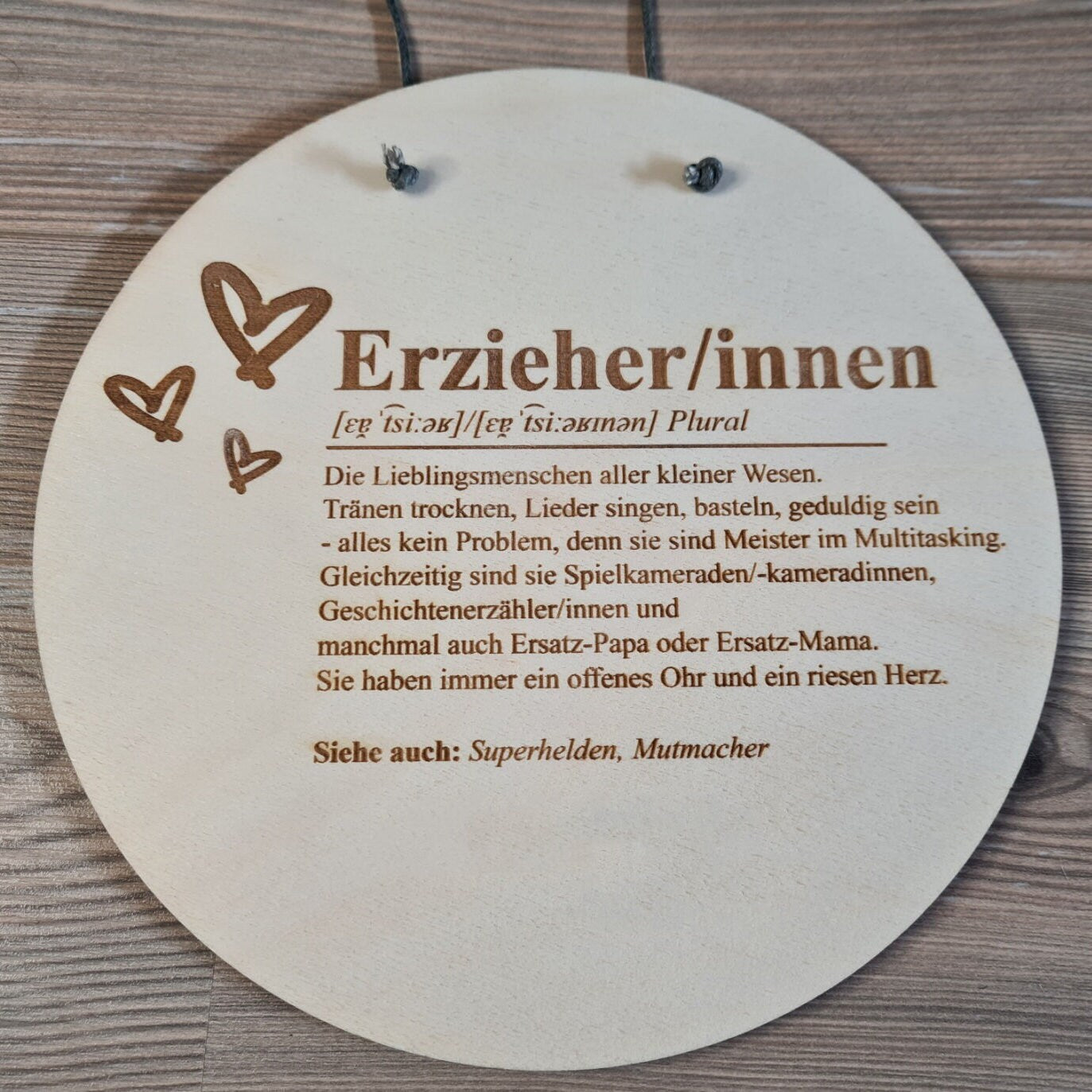 Holzschild Definition "Erzieher/innen"